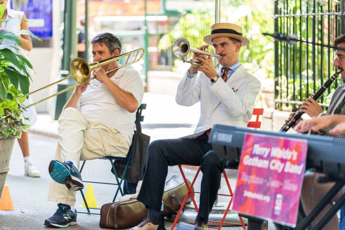 musicians play ragtime outdoors in Midtown Manhattan.